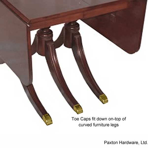 Brass Toe Caps installed on Curved Furniture Legs - Paxton Hardware
