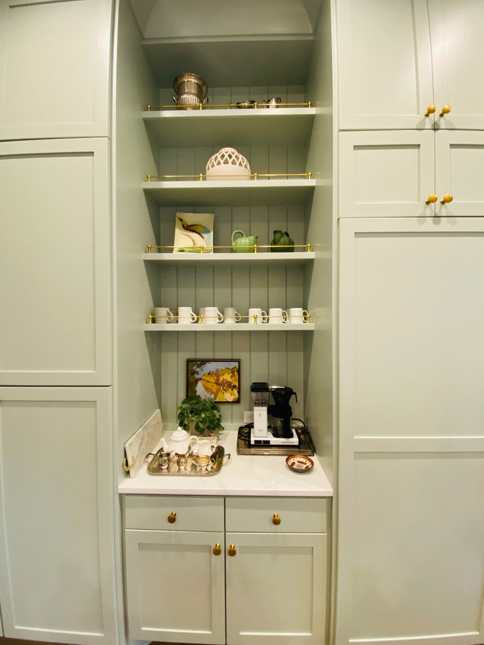 Kitchen shelves with brass gallery rail