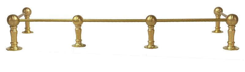 Brass Cabinet Rail easily attaches to wood shelves