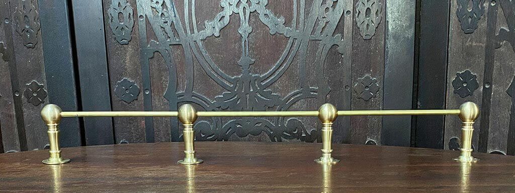 Brass Cabinet Rail easily attaches to wood surface