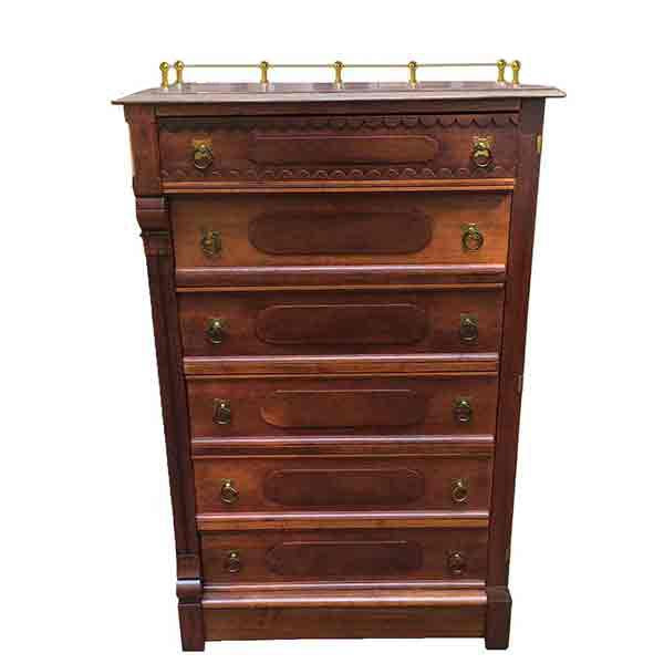 Brass Gallery Rod provides decorative top on tall chest