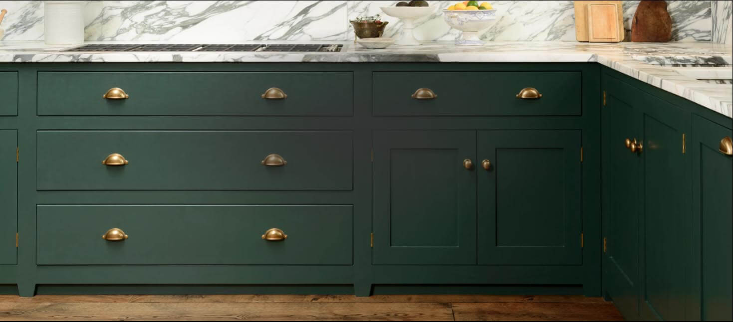 Kitchen cabinet displaying brass hardware - Paxton Hardware