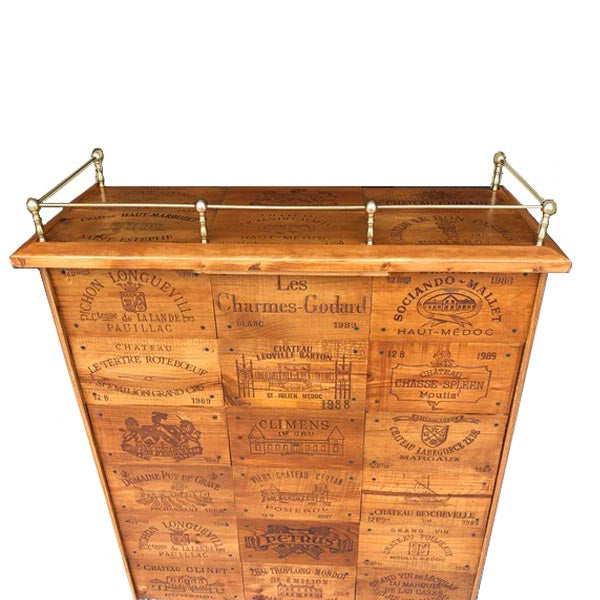 Brass Railing tops bar to keep bottles and glasses in place.