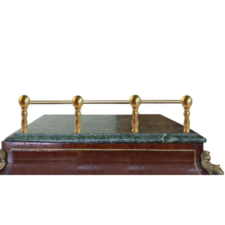Brass shelf rail on stone surface - Paxton Hardware